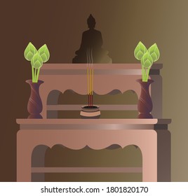 Buddha on the shelf with lotus flowers in a vase