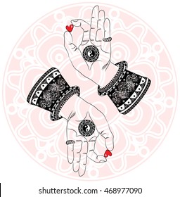 Buddha's hands with the third eye and yin yang symbol on the abstract background.