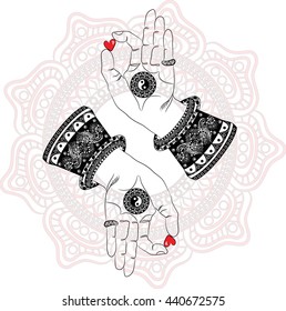 Buddha's hands with yin yang symbols and hearts on mandala background.