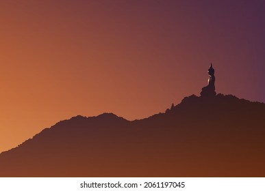 Buddhism vector illustration of a buddha statue in sitting position on the peak of the mountain with the beautiful sunlight is shining up from the right in the morning
