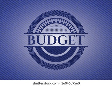 Budget emblem with jean background. Vector Illustration. Detailed.