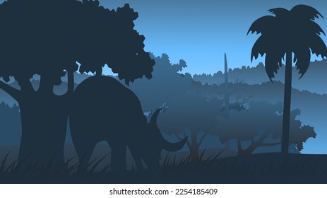 Buffalo on the grassfield. tropical forest at night