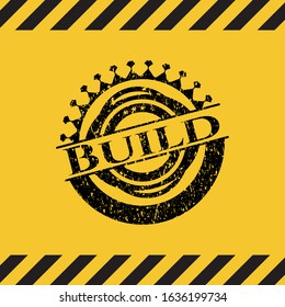 Build black grunge emblem with yellow background. Vector Illustration. Detailed.
