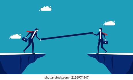 Build a business bridge. A team of businessmen building a bridge. business concept 
