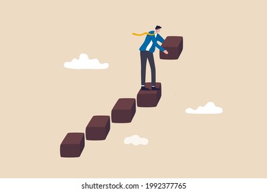 Build business success stairs, self development or career growth and job improvement, growing up or job promotion concept, businessman building staircase to progress ascending business growth.