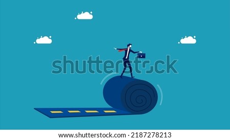 Build a career path. Start your own way. Businessman rolling the road carpet