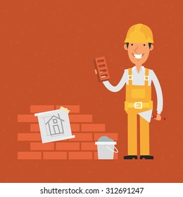 Builder holding trowel and brick