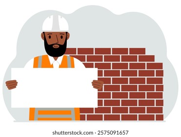 Builder man holding a white sheet of paper for text. Brickwork next to him.