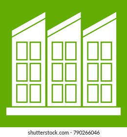Building icon white isolated on green background. Vector illustration