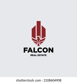 building logo design with silhouette falcon graphic for real estate