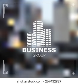 Building logo vector silhouette on blurred nature background
