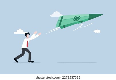 Building wealth, making profit from investment, financial opportunity, opportunity to increase income concept, Businessman throwing paper plane of banknote up to the air.