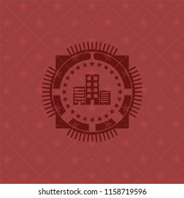 buildings icon inside badge with red background