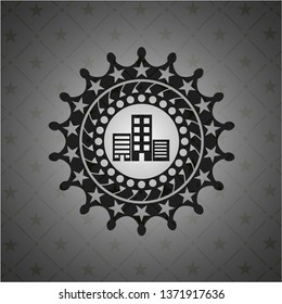 buildings icon inside black emblem