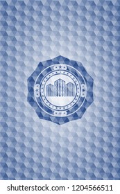 buildings icon inside blue badge with geometric background.