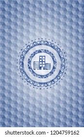 buildings icon inside blue emblem or badge with geometric pattern background.