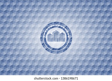 buildings icon inside blue emblem with geometric pattern background.