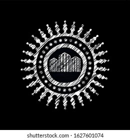 buildings icon inside chalkboard emblem on black board