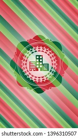 buildings icon inside christmas badge background.