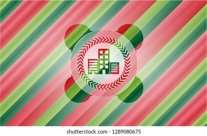 buildings icon inside christmas colors emblem.