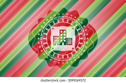 buildings icon inside christmas colors style emblem. 