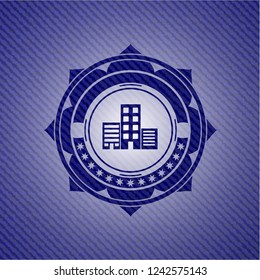 buildings icon inside emblem with denim high quality background