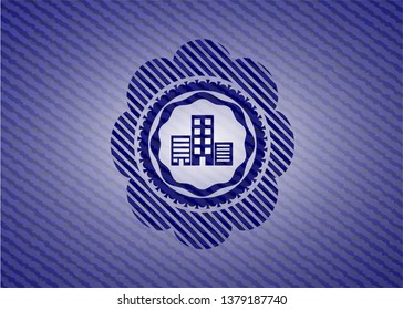 buildings icon inside emblem with denim high quality background