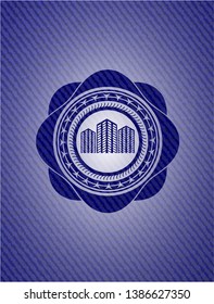 buildings icon inside emblem with jean background