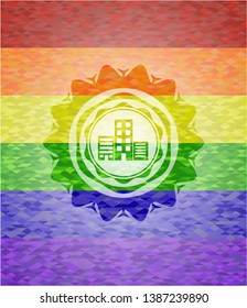 buildings icon inside emblem on mosaic background with the colors of the LGBT flag