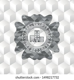 buildings icon inside grey badge with geometric cube white background