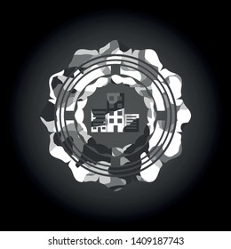 buildings icon inside grey camouflaged emblem