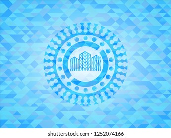 buildings icon inside light blue mosaic emblem