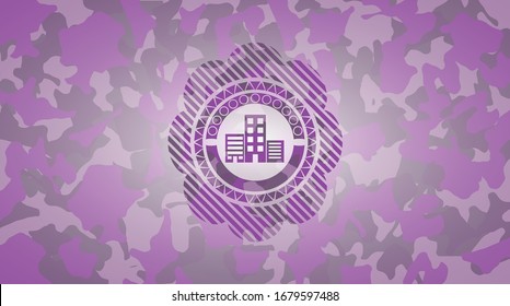 buildings icon inside pink camouflage emblem
