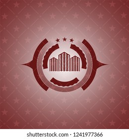 buildings icon inside red emblem