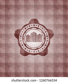 buildings icon inside red seamless emblem or badge with abstract geometric pattern background.