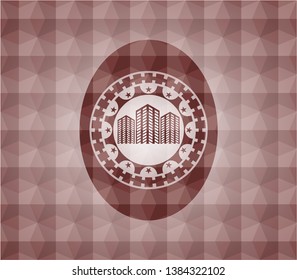 buildings icon inside red seamless geometric badge.