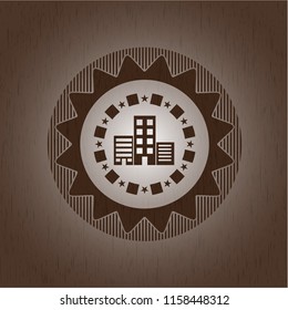 buildings icon inside retro style wood emblem