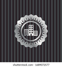buildings icon inside silver badge or emblem