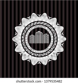 buildings icon inside silvery badge