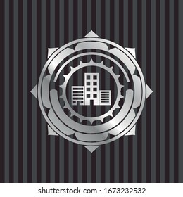 buildings icon inside silvery badge or emblem
