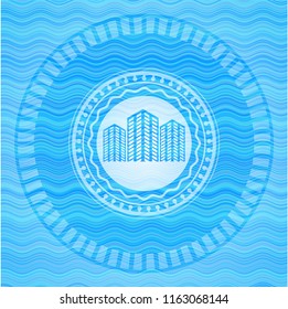 buildings icon inside sky blue water style badge.