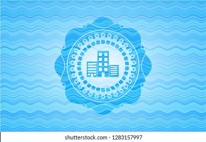 buildings icon inside water representation style badge.