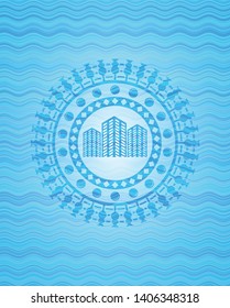 buildings icon inside water representation style badge.