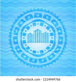 buildings icon inside water wave representation style emblem.