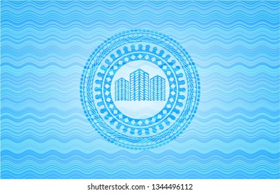 buildings icon inside water wave representation style emblem.