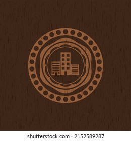 buildings icon inside wood emblem. 