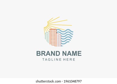 The building's logo on the beach with the art of ocean waves and sunlight