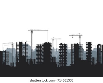 Buildings under construction and building cranes.