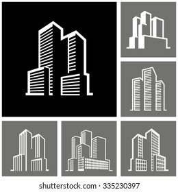 Buildings vector white icons on dark background 