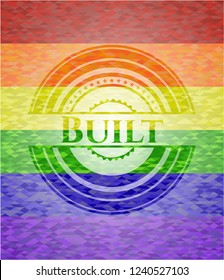 Built on mosaic background with the colors of the LGBT flag